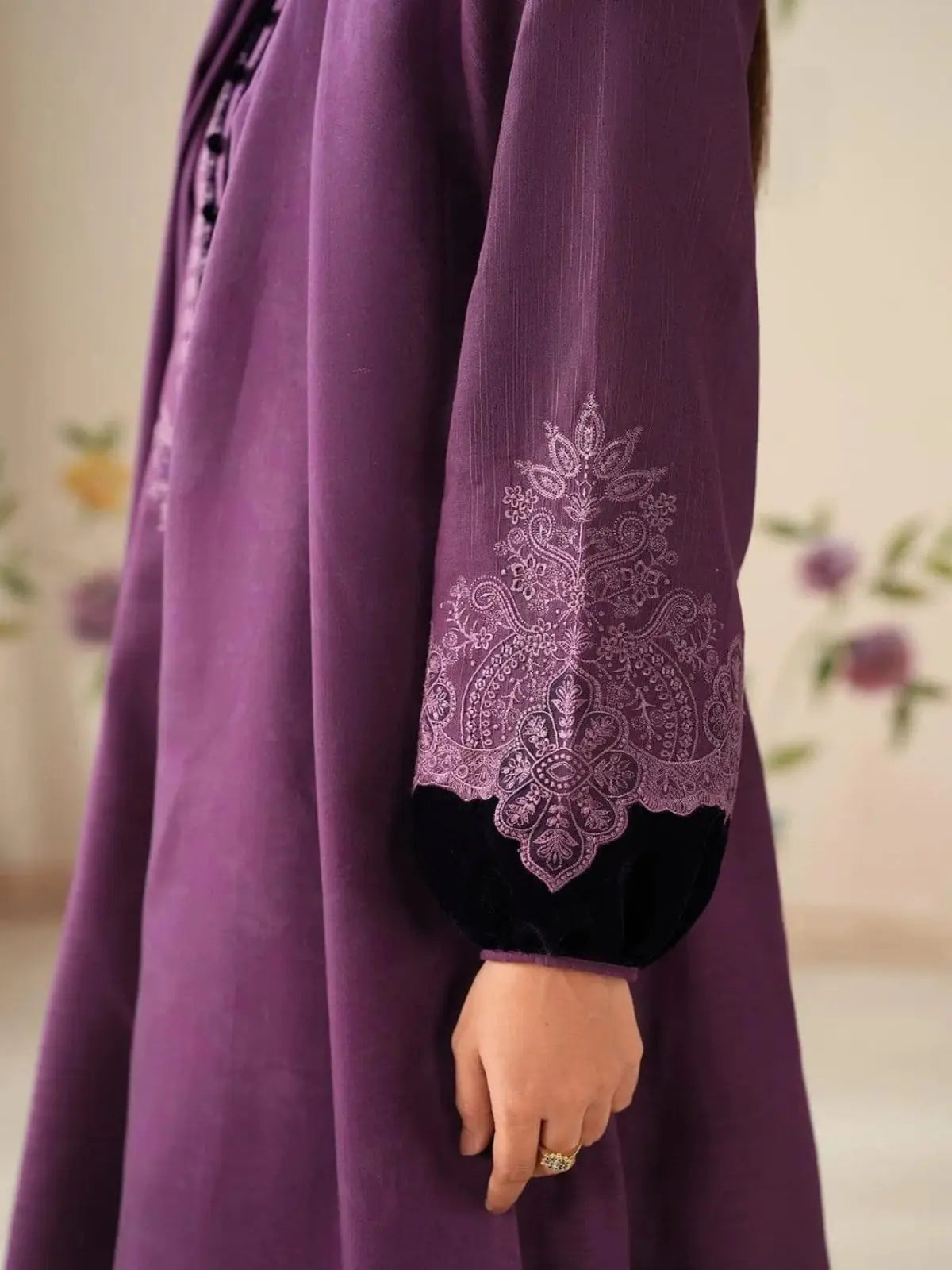 Women's unstitched purple embroidered suit with intricate sleeve detailing