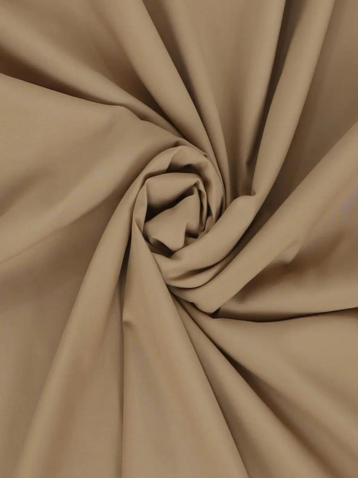 Light brown Swiss plain suit fabric, close-up texture with soft folds, unstitched material