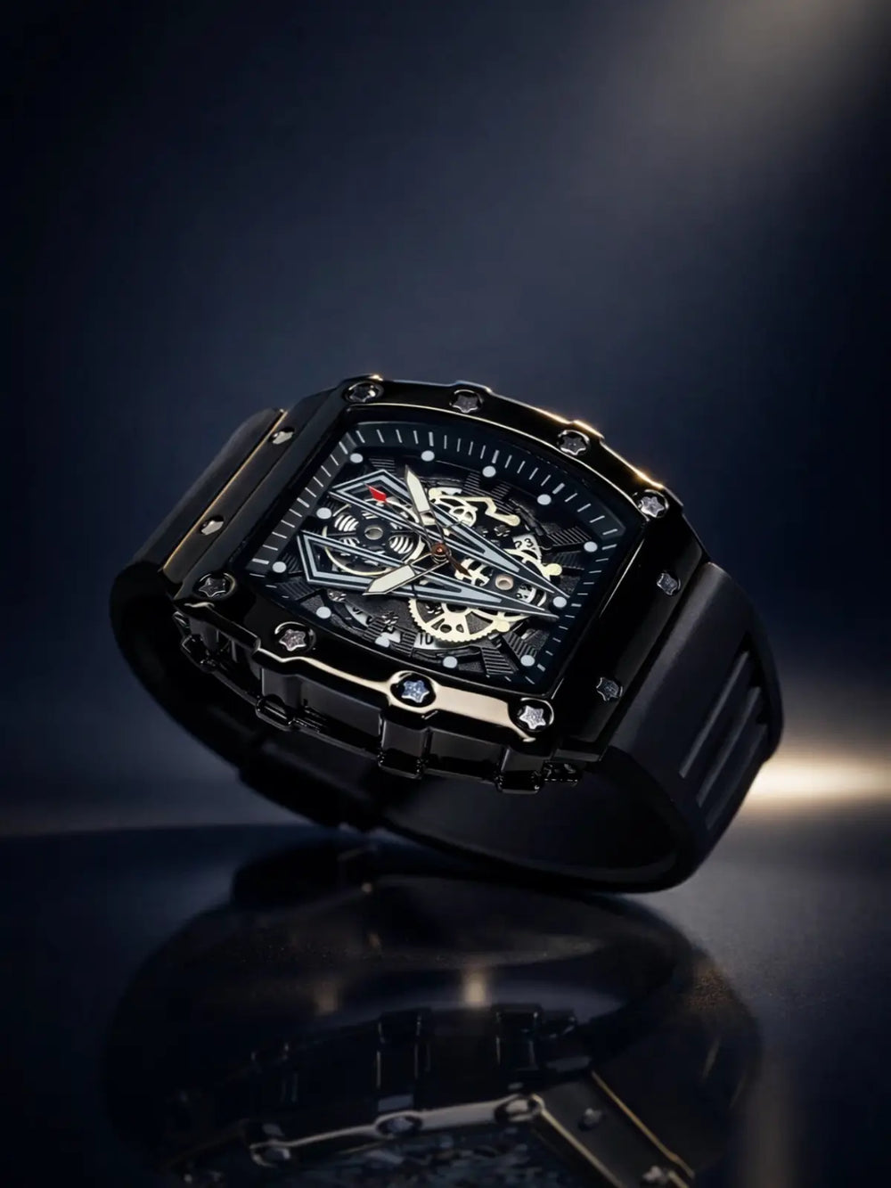 Luxury black watch with intricate design on a dark background