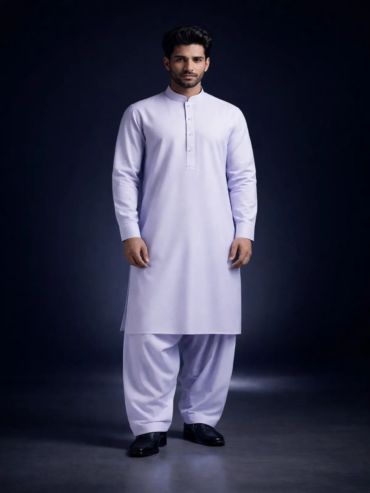 Men's white wash and wear unstitched suit fabric displayed on model in shalwar kameez style