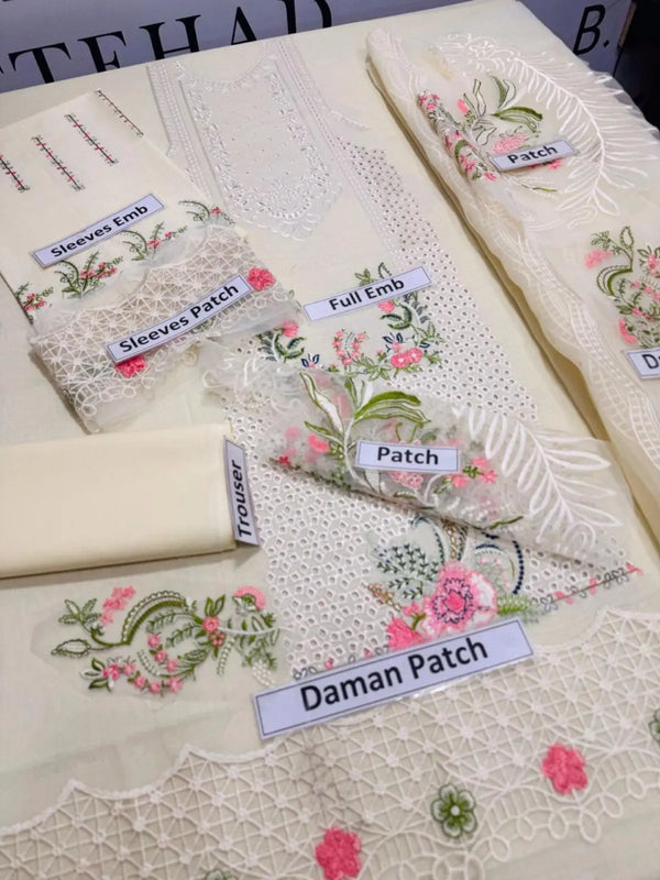 Off-white unstitched embroidered women's suit with floral patches and lace details